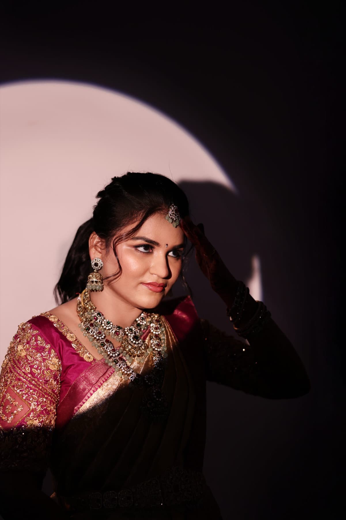 Bridal studio portrait with a soft pink backlight