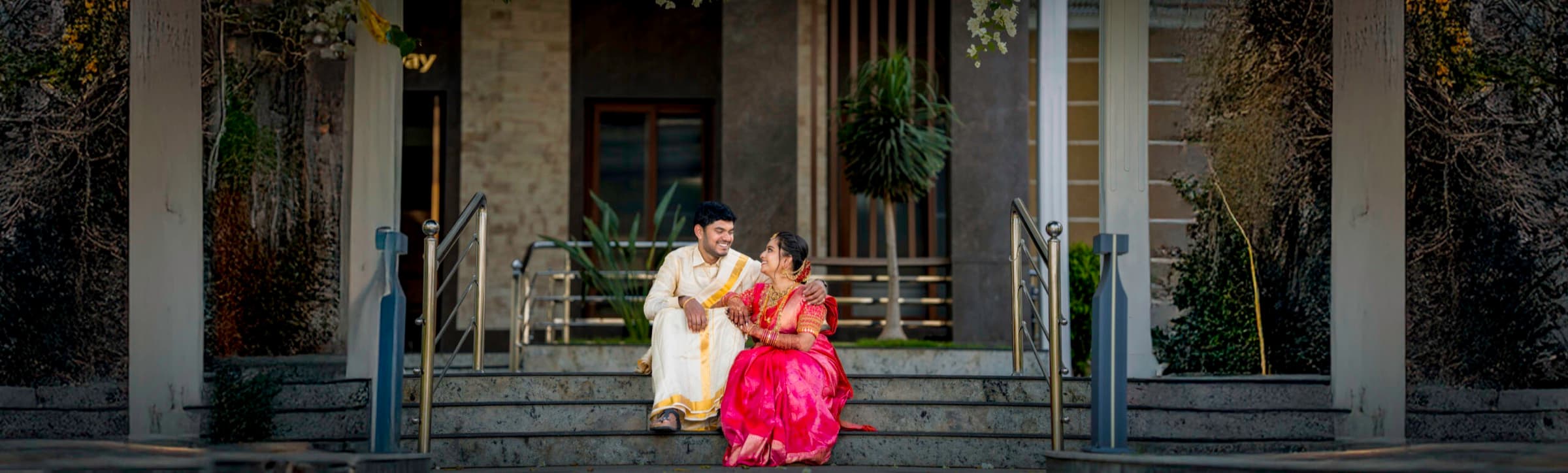 Wedding couple in traditional attire, wide panorama